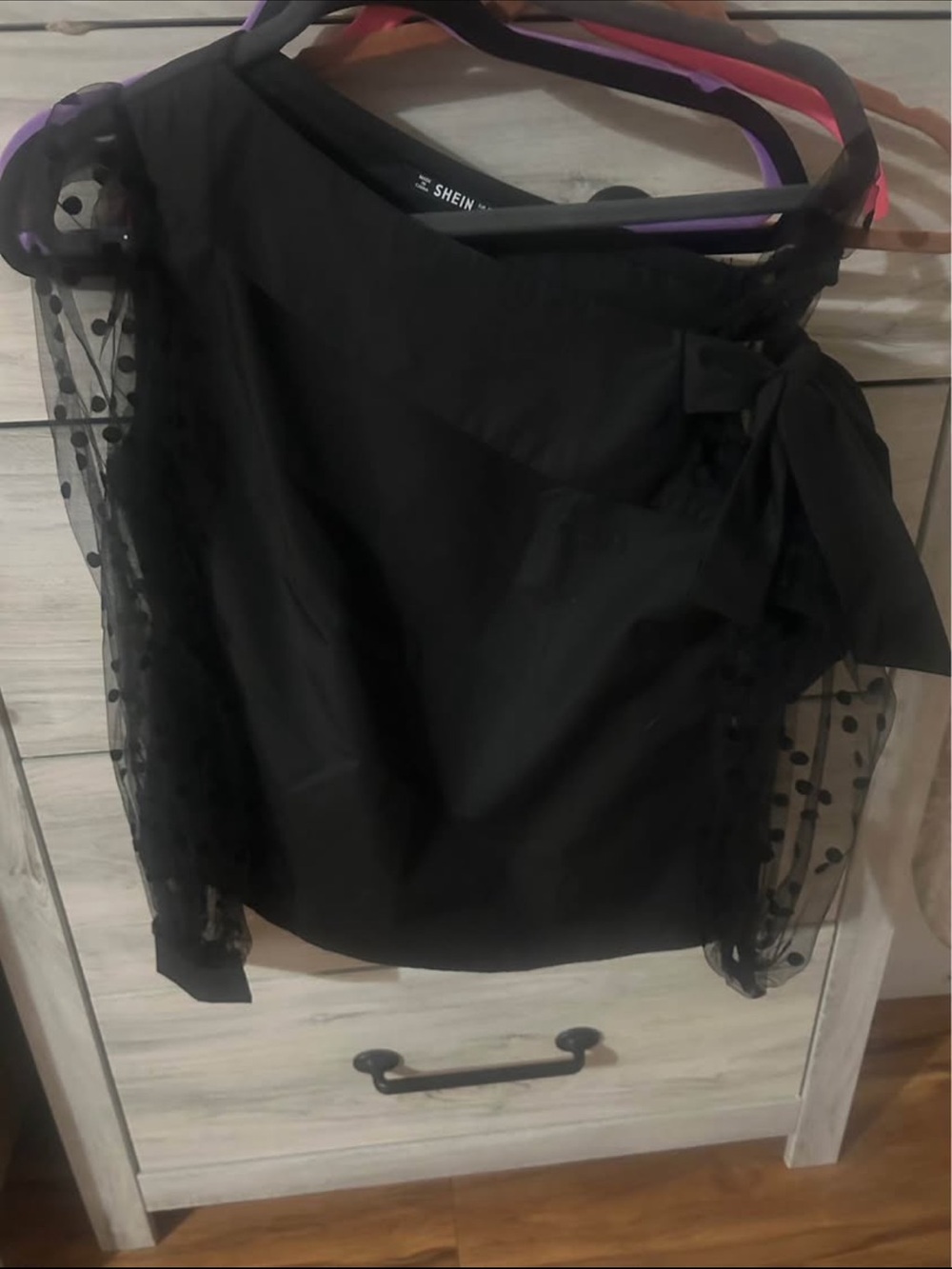 Womens black asymmetrical off the shoulder top with mesh sleeves